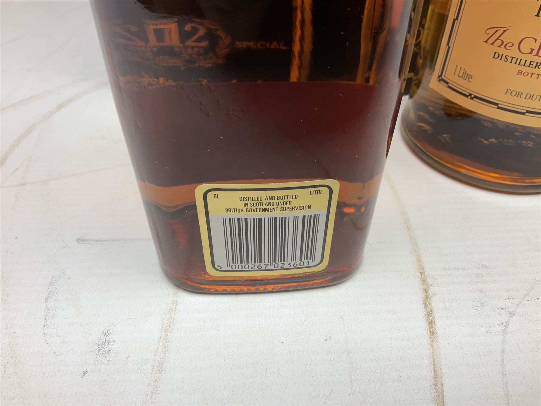 Glenmorangie, ten year old Scotch whisky, 1 litre 43% vol, Grant's twelve year old Scotch whisky 1 litre, 43 G.L and Johnnie Walker Black Label, twelve year old Scotch whisky, 1 litre 43% vol, all boxed (3)