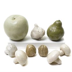 Collection of ceramic fruit and vegetables, including raku examples, comprising two walnut...