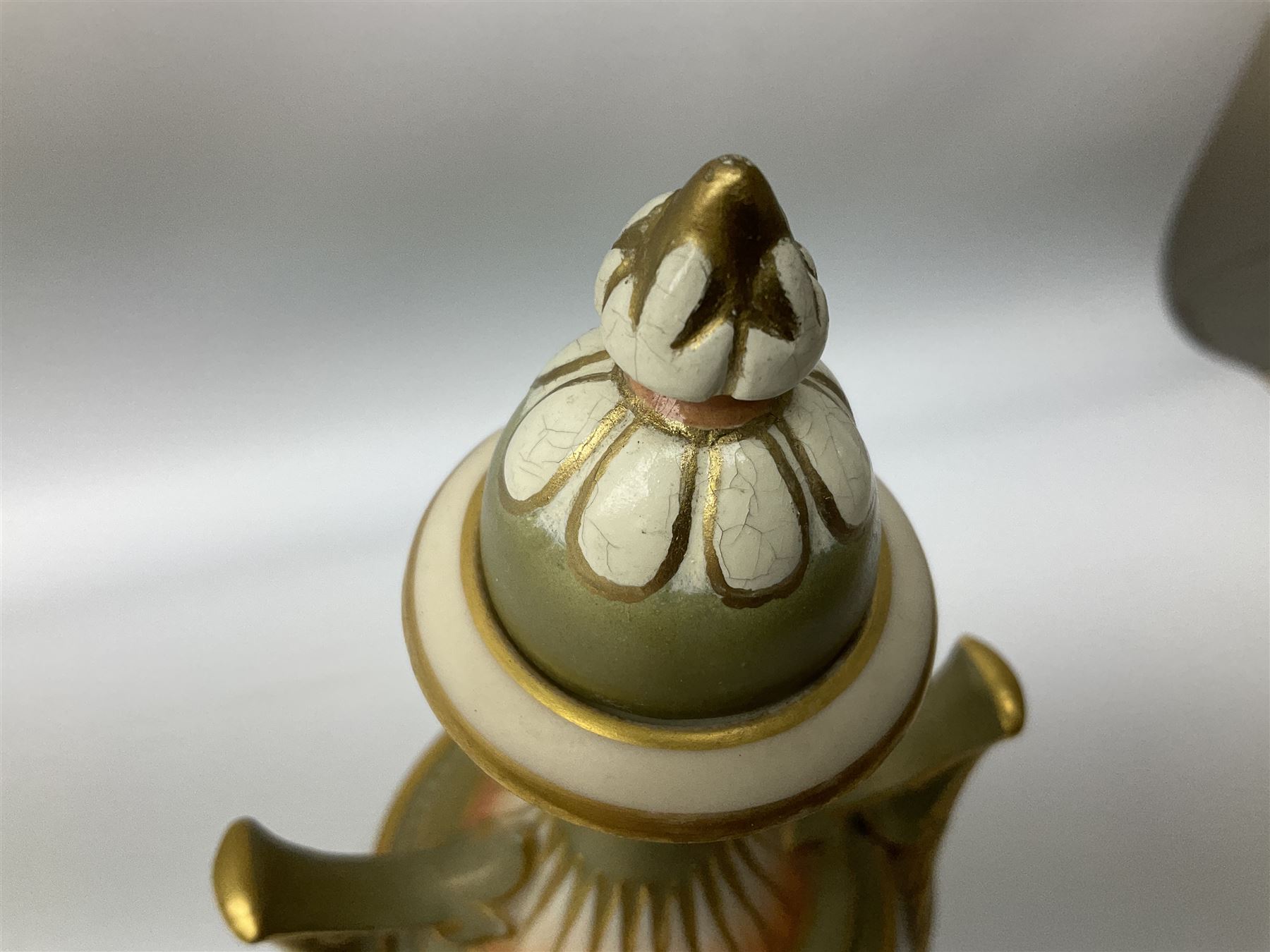 Early 20th century Royal Worcester vase decorated by Harry Davis, of ovoid form with twin acanthus mounted handles and waisted high neck supporting a domed cover, upon a circular foot, the body hand painted with sheep in a highland landscape, signed H Davis, with puce printed marks beneath including shape number 2425, and date code for 1907, H27.5cm