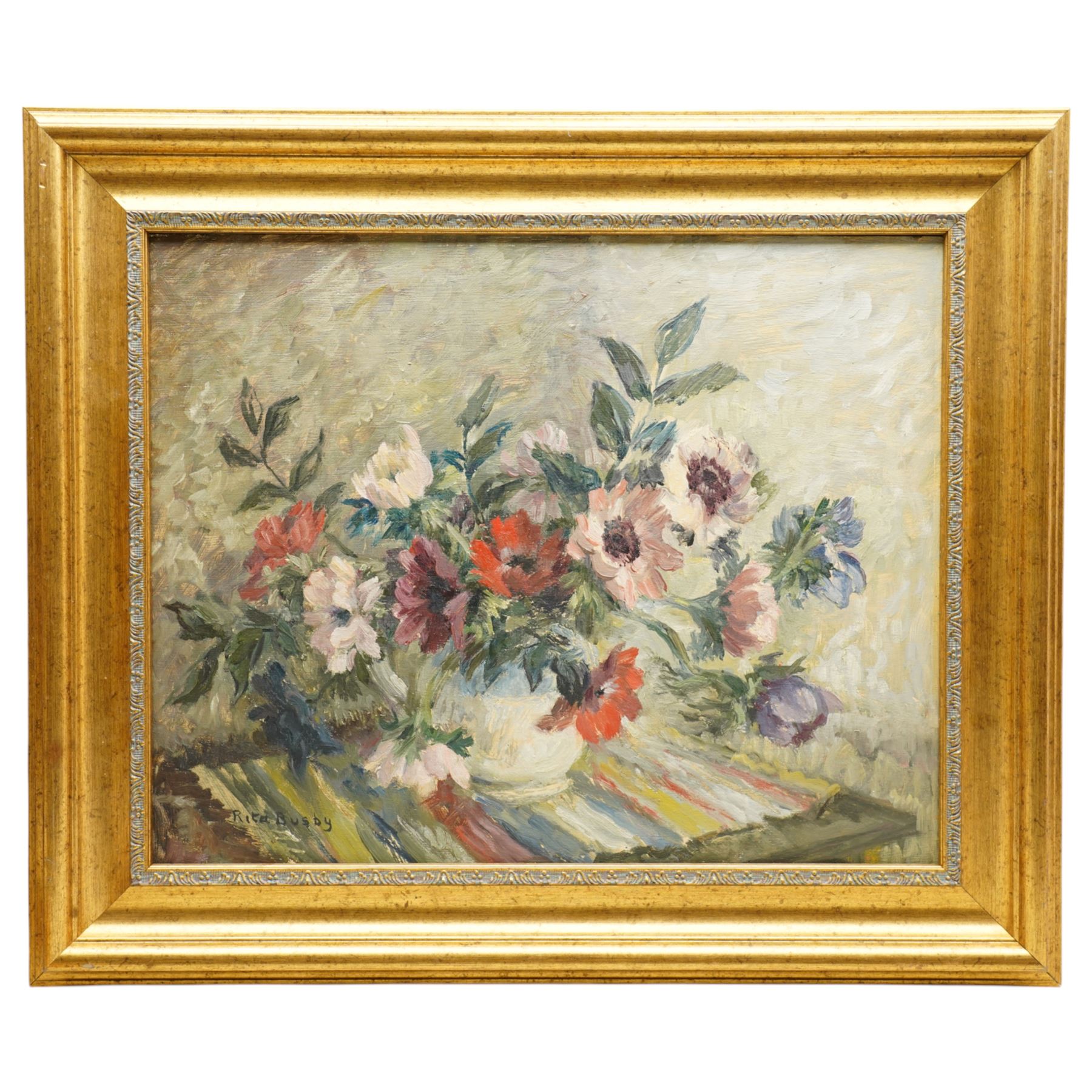 Rita Busby (British 20th century): Still Life of Flowers in a Vase, double-sided oil on board signed 40cm x 50cm; R Wyatt (British 1945-): Still Life of Chrysanthemums by the Window, oil on board signed 45cm x 50cm (2)