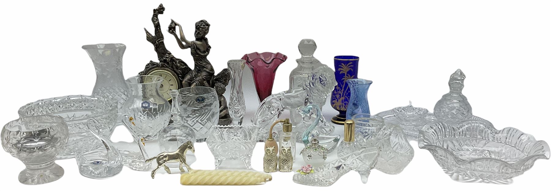 Juliana bronze effect quartz clock depicting a woman and child H32.5, along with an collection of glassware, including a cathiness vase, Royal Scot cranberry glass tulip vase, a cut glass decanter etc. 