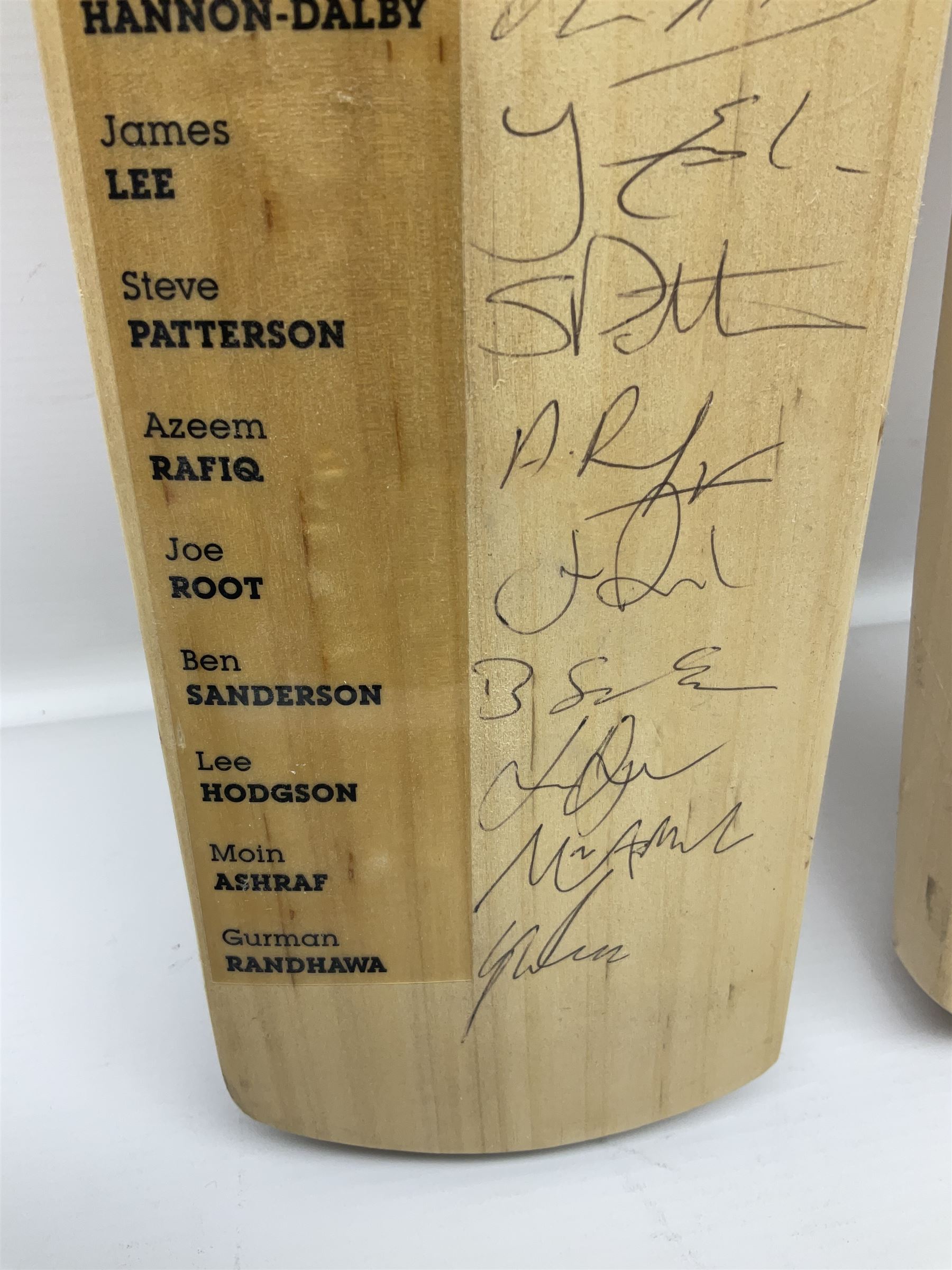 Two signed Yorkshire County cricket bats, from 2011 and 2012 seasons, bearing signatures including Adil Rashid, Andrew Gale, Ryan Sidebottom, Gary Ballance etc