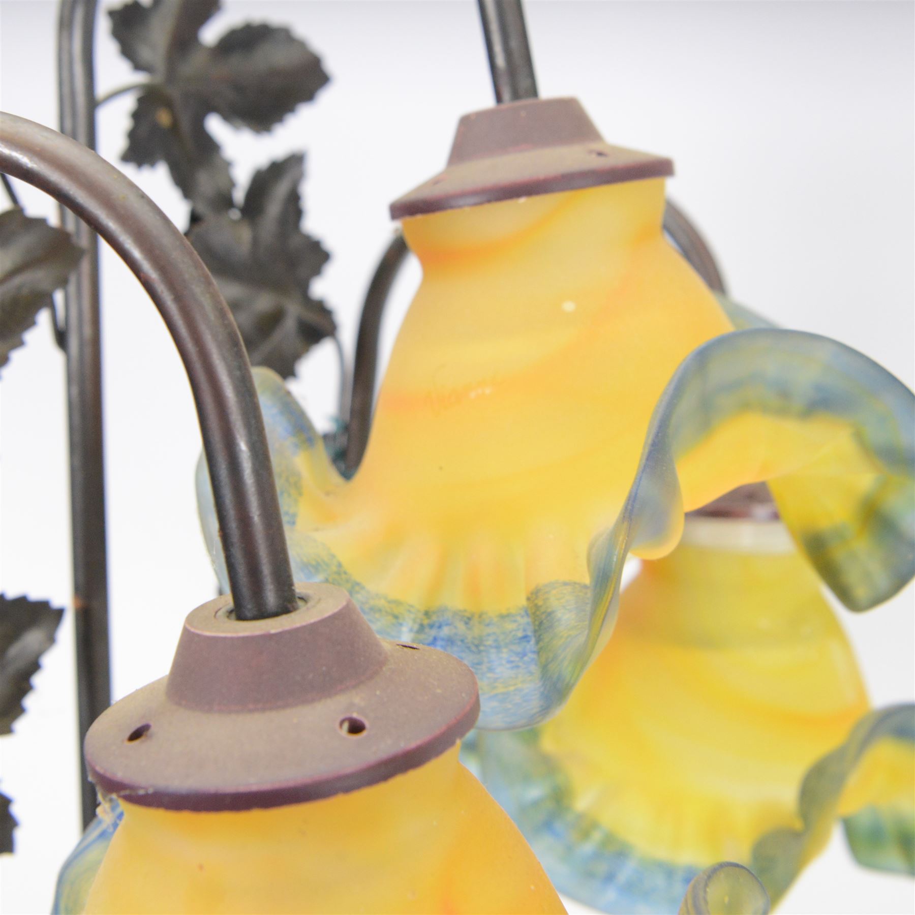 20th century composite figural table lamp with three floral moulded glass shades, H88cm