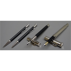  Writing Instruments - Graf Von Faber-Castell, black fountain pen with '18ct' gold nib, ballpoint pen and propelling pencil and a similar chrome cased fountain pen with '18ct' gold nib (4)  