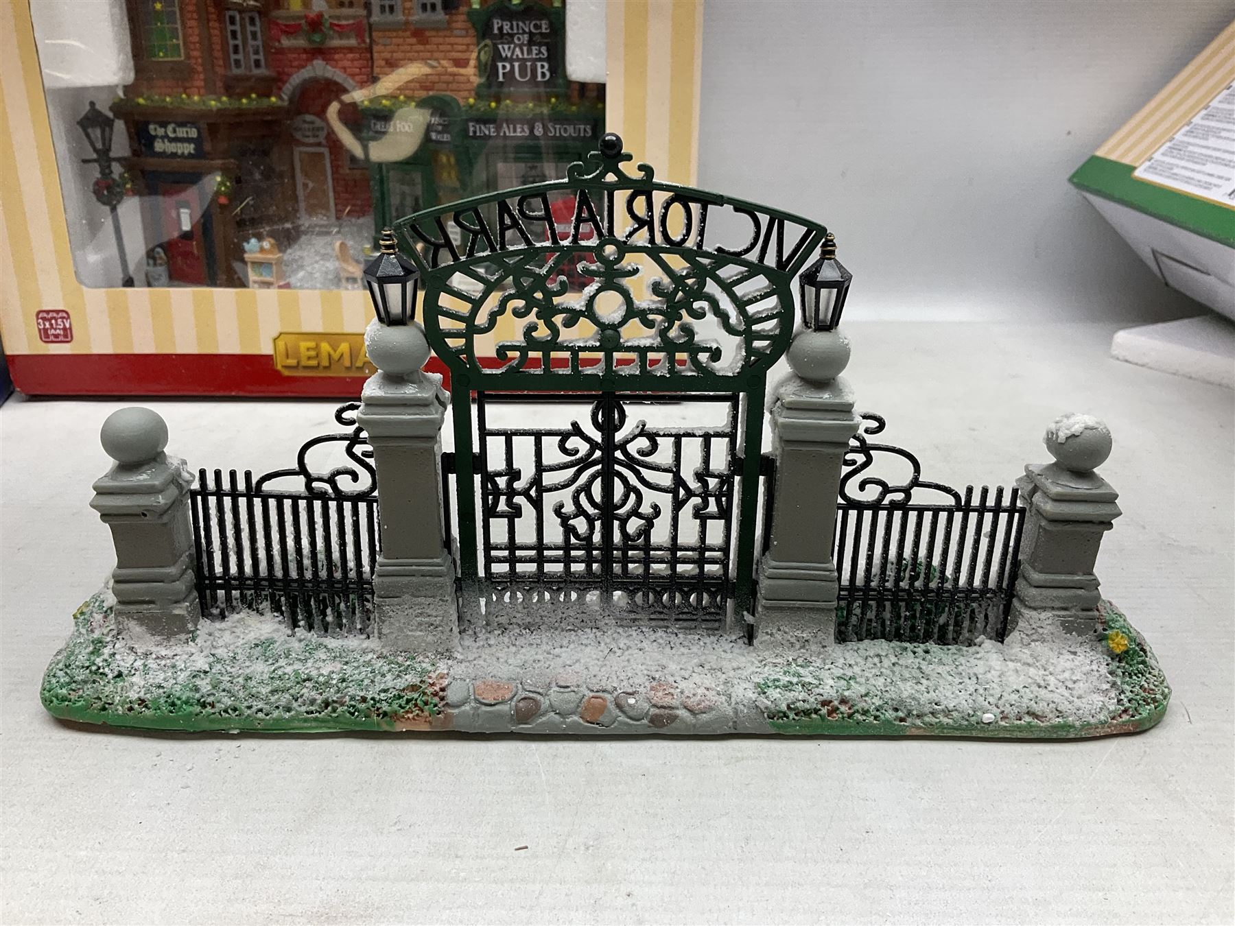 Christmas decorations; Lamax light up English Lane wall hanging, together with Lemax Frolic in the snow, Victorian parkway and other christmas signs and figures