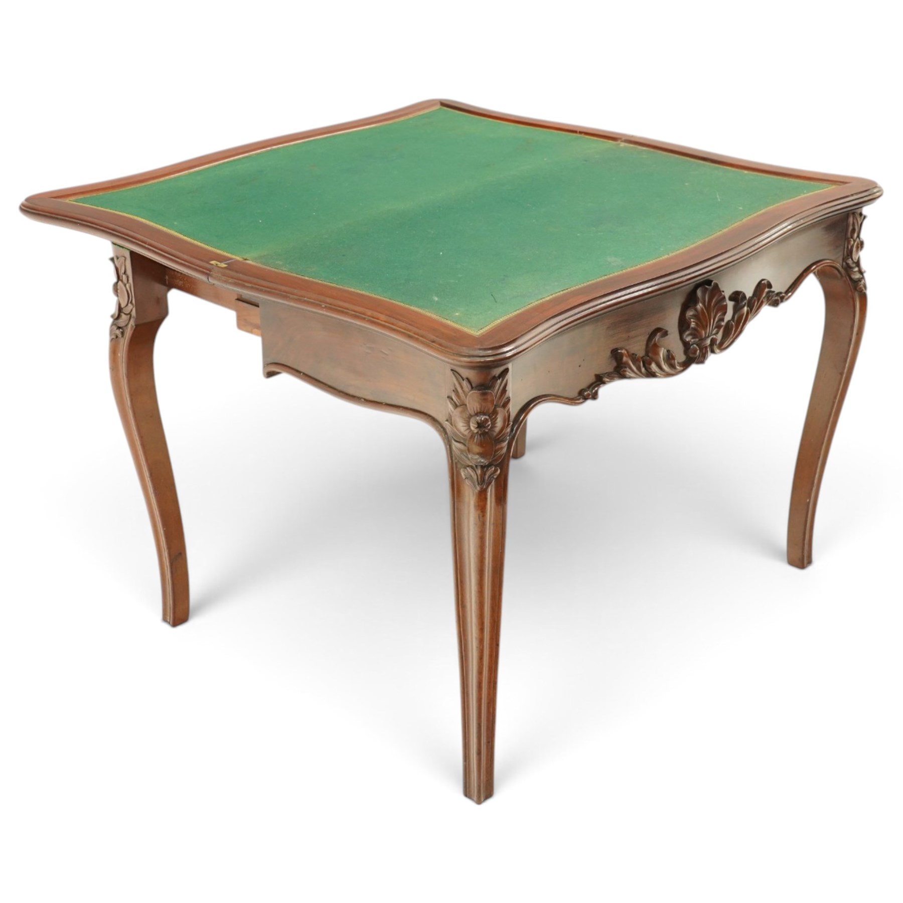 Victorian carved mahogany card table, shaped rectangular top with hinged fold-over top enclosing baize lined interior, supported on rear draw-supports, the frieze carved with anthemion and acanthus leaves, on cabriole legs