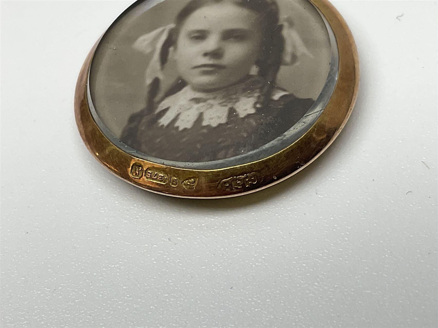 Victorian and later 9ct gold jewellery including glazed photo pendant, three gold cased wristwatches, signet ring and a cameo brooch, all hallmarked and silver jewellery including fobs, wristwatch, brooches and rings etc 