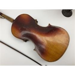 Violin for restoration, labelled Antonius Stradiuarius, L57cm, along with bow for restoration and table globe upon turned wood column and circular base
