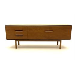 White and Newton Ltd of Peterborough teak sideboard, fitted with three long drawers and two cupboards enclosing shelving, raised on shaped supports 
