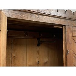 Late Victorian Aesthetic movement pitch pine and oak hall wardrobe, two paneled doors enclosing hooks, W90cm, H211cm, D43cm