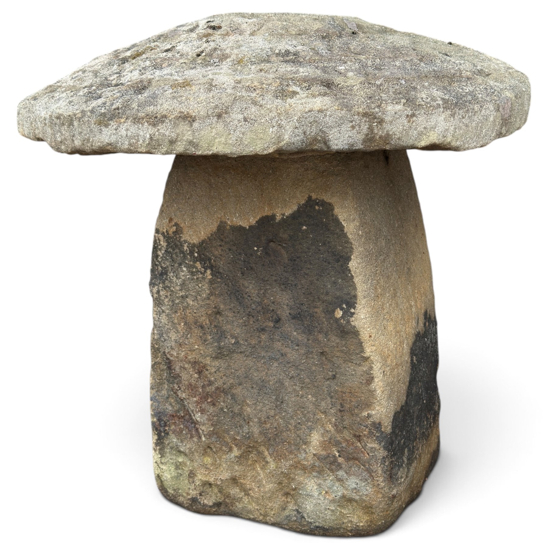 Pair of 19th century weathered hewn sandstone two-piece staddle stones, domed circular top over a tapering base