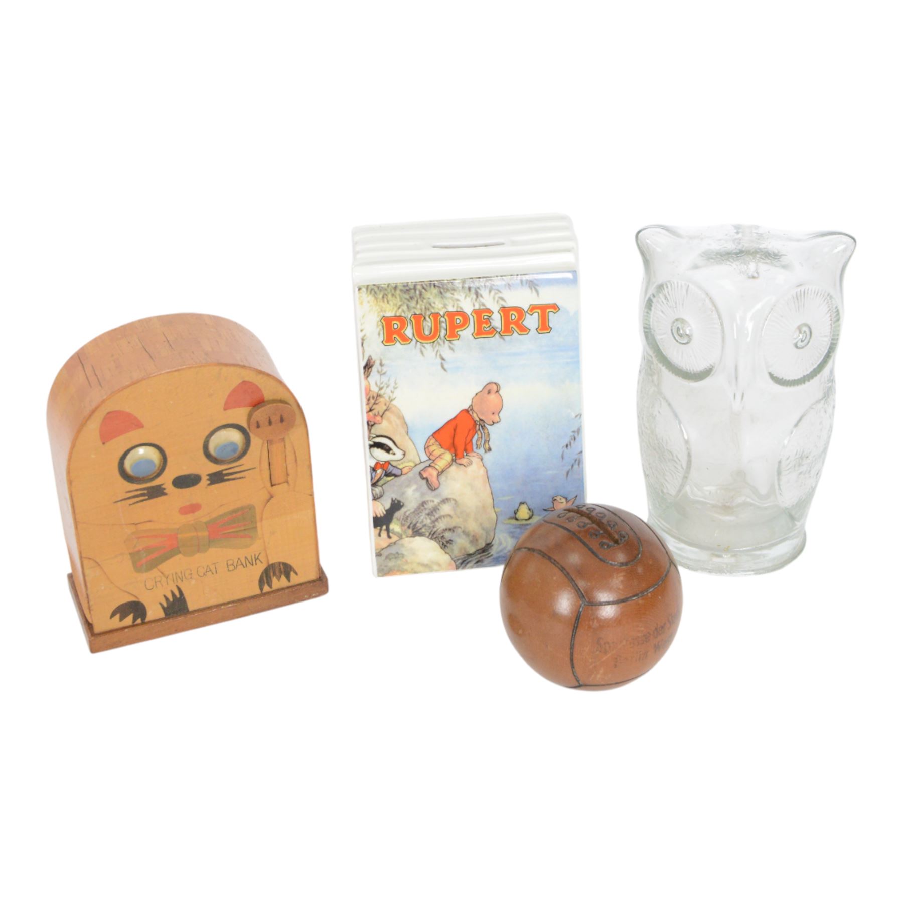 Six vintage money boxes, including papier mache Dr Barnados Homes, Wedgwood Rupert Bear, wooden crying cat, Berlin West baseball, glass owl, etc