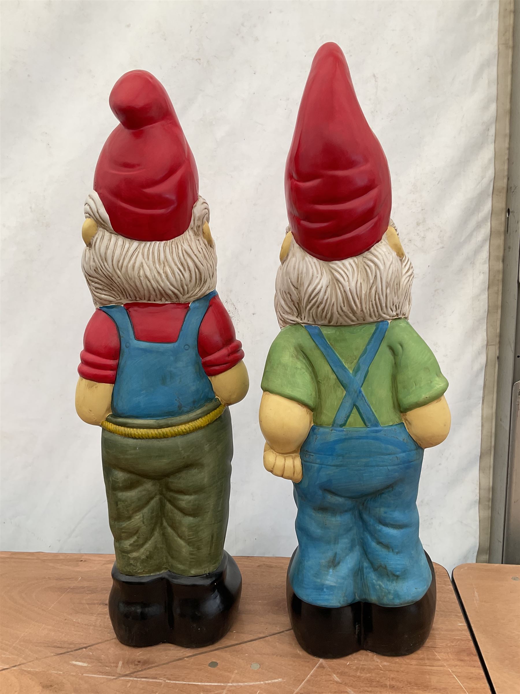 Pair of large indoor or outdoor painted garden gnomes  - THIS LOT IS TO BE COLLECTED BY APPOINTMENT FROM DUGGLEBY STORAGE, GREAT HILL, EASTFIELD, SCARBOROUGH, YO11 3TX