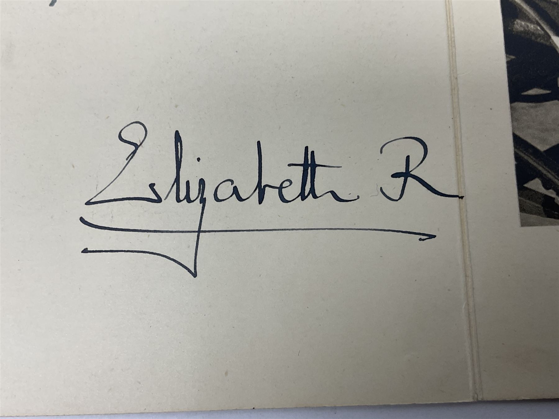 King George VI and Queen Elizabeth - signed 1949 Christmas card with gilt embossed crown to cover, black and white photograph to the interior, of The King and Queen riding in an open carriage to their Silver Wedding Celebration, signed 'George R. Elizabeth R.'