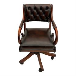 Stained beech swivel office desk chair, scrolled arm supports, upholstered in buttoned leather