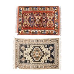 Two rugs, small Bokhara-type rug, terracotta ground with repeating hooked lozenge medallio...
