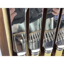 Twelve place setting canteen of cutlery by Lee & Wigfull Ltd, cased in an oak  chest, with key, meat carvers are missing, H18cm, L44cm 