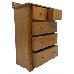 Squirrelman - oak miniature chest, the raised back carved with two squirrel motifs, fitted with two short and three long drawers, by Wilfred Hutchinson, Husthwaite, Thirsk