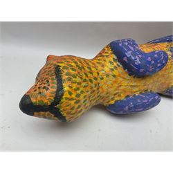 Helen Skelton (British 1933 – 2023): Two carved wooden abstract sculptures, one modelled as a dog, the other modelled as a bear, both with painted stippled decoration, largest H20cm. Born into an RAF family in 1933 in Kent and travelled the world extensively during her childhood. After settling in Bridlington, Helen immersed herself in painting, textiles, and wood sculpture, often inspired by nature's beauty. Her talent was showcased in a one-woman show at Sewerby Hall and recognised with the sculpture prize at Ferens Art Gallery in 2000. Sadly, Helen’s daughter passed away from cancer in 2005. This loss inspired Helen to donate her sculptures to Marie Curie upon her passing in 2023.