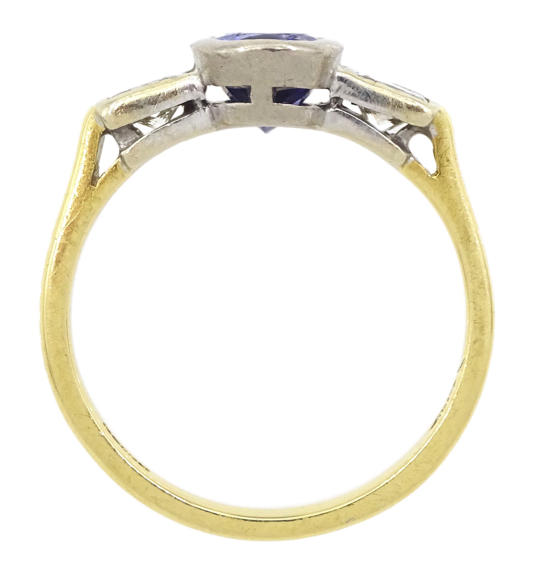 18ct gold three stone oval cut tanzanite and radiant cut diamond ring, hallmarked, tanzanite approx 1.10 carat, total diamond weight approx 0.40 carat