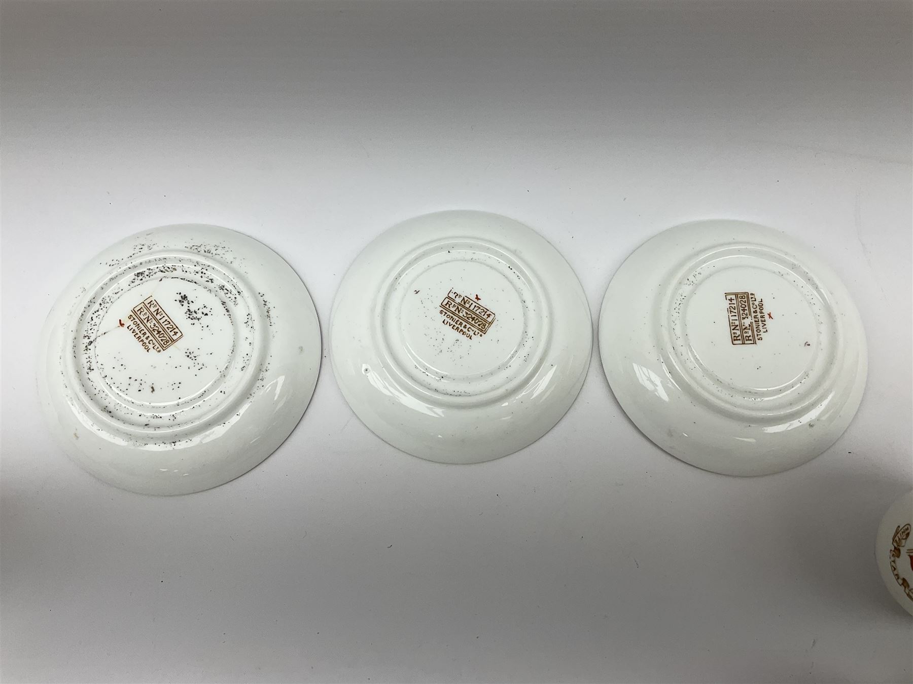 White Star Line, six pieces of porcelain by Stonier & Co. Liverpool, comprising four tea cups, three saucers, jug and three pin trays, registered design no. 117214/324028, printed mark beneath 
