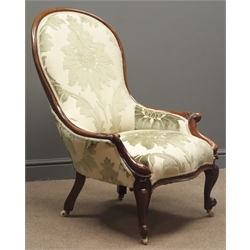  Victorian walnut framed nursing chair upholstered in a soft apple Duresta fabric, cabriole legs and castors  