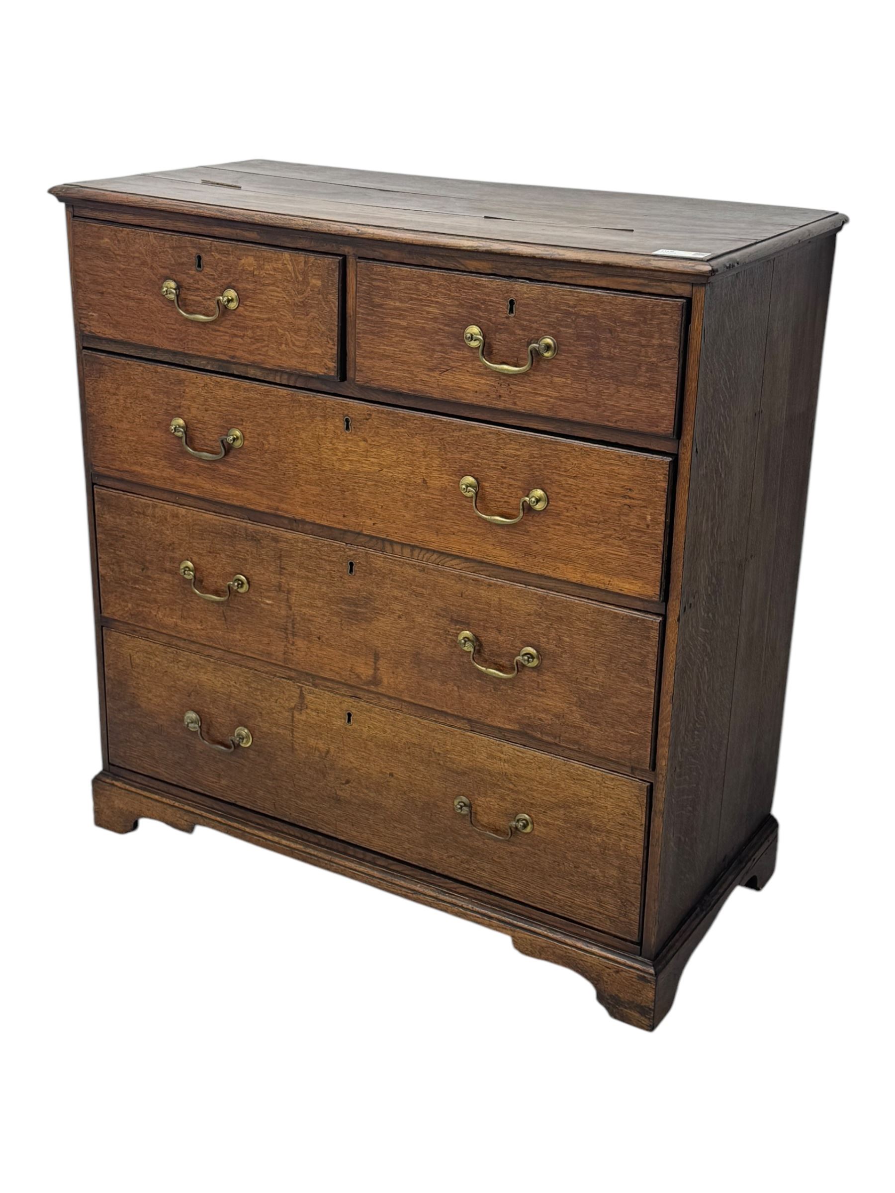 19th century oak chest, rectangular top over two short and three long drawers, on bracket feet