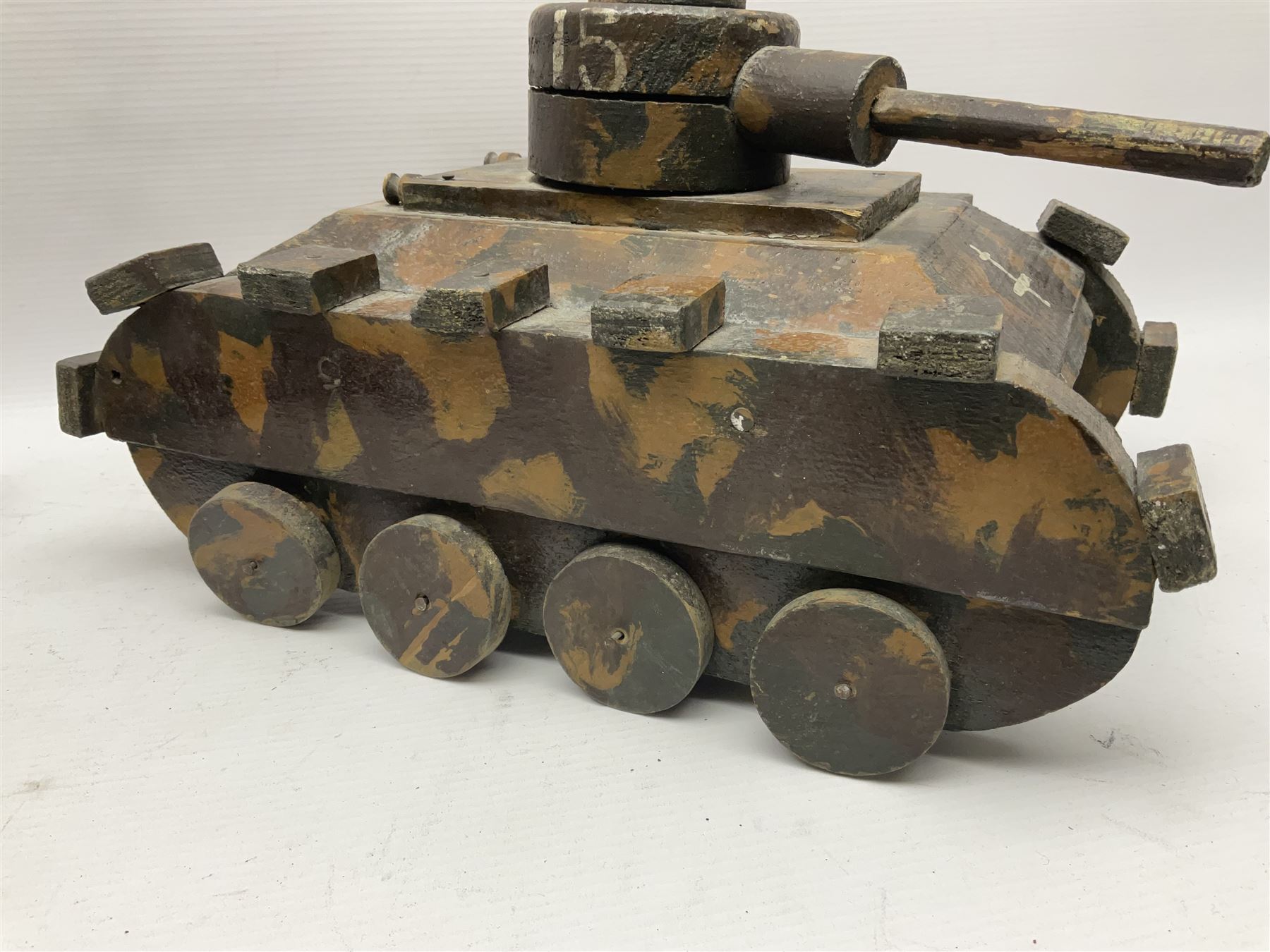 1940s French wooden eight wheel model FFI free tank, painted in brown camouflage, together with a 1940s wooden scratch built model of a landing craft, tank H18cm, W31cm