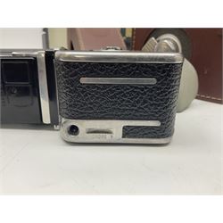 Bolex Paillard P3 Zoom Reflex camera body, serial no 38090, with 'B te S.G.D.G Som Berthiot Pan-Cinor 1:1.9 f=8a 40' lens, serial no. 40251438 in case, Kodak Brownie movie camera, Kodak model 2 Brownie movie camera and a Kodak 8 Movie Projector A-15G and other camera equipment 