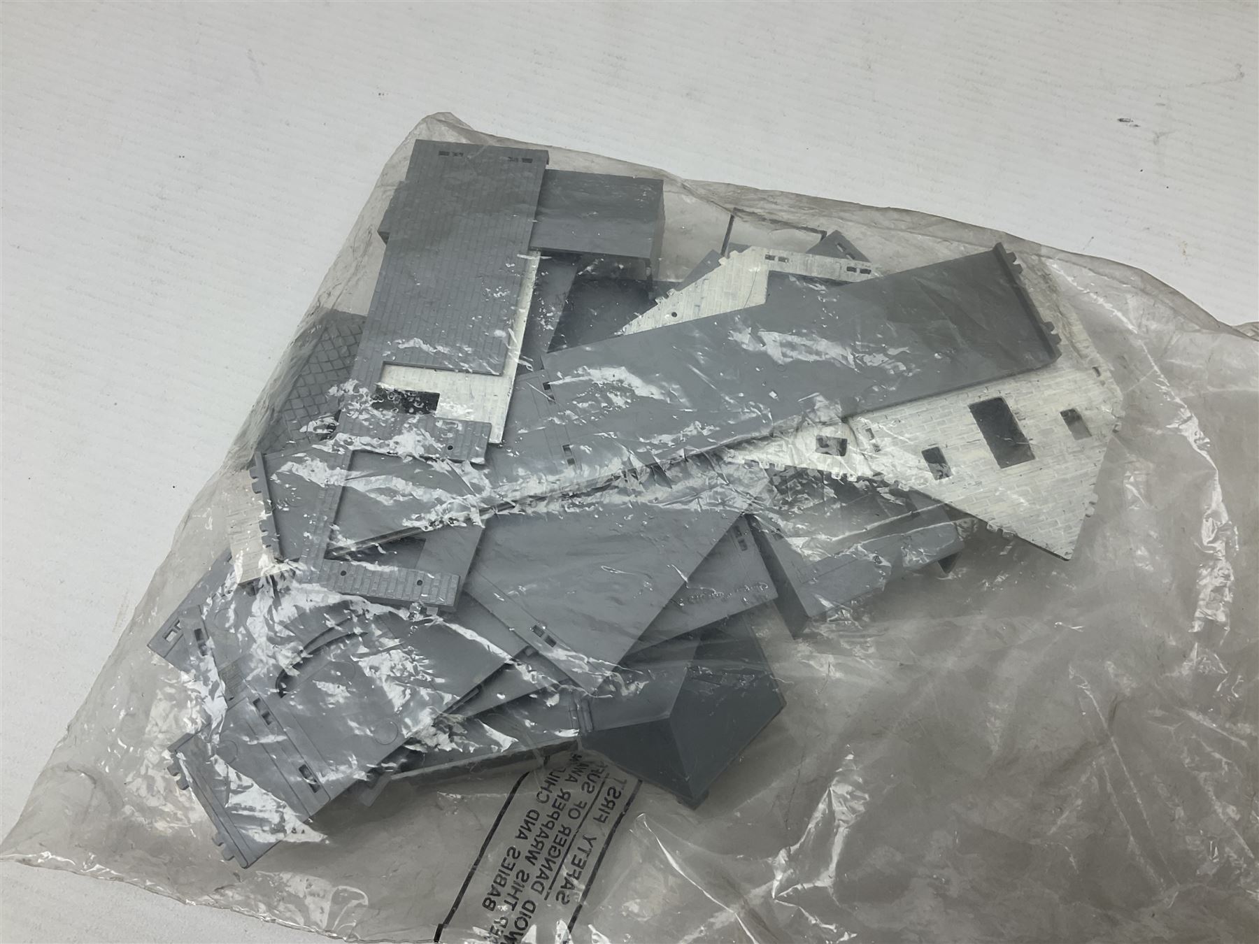 Three unmade construction kits - Airfix 1:24 scale Supermarine Spitfire Mk.1A; predominantly in unopened factory packaging with instructions and decal sheet; Frog Shell Welder with instructions; and Airfix Battle of Waterloo Farmhouse (instructions on box base); all boxed (3)