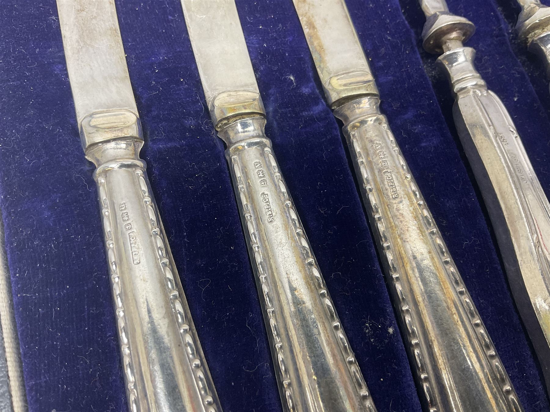 Cased set of six silver handled dessert knives and forks, hallmarked 