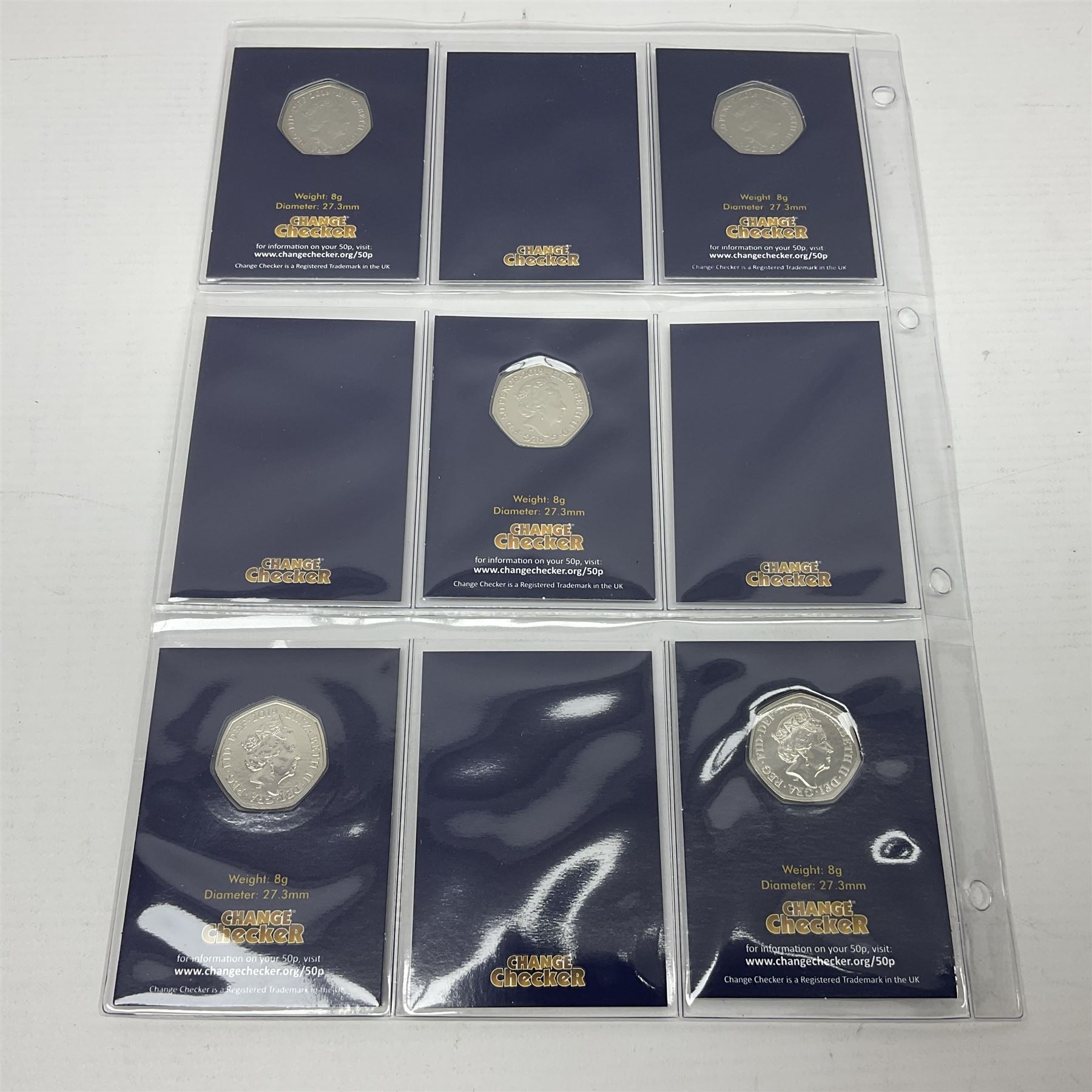Queen Elizabeth II '50th Anniversary of the 50p 1969-2019' set of five fifty pence coins including 2019 Kew Gardens re-issue, each housed on Change Checker card