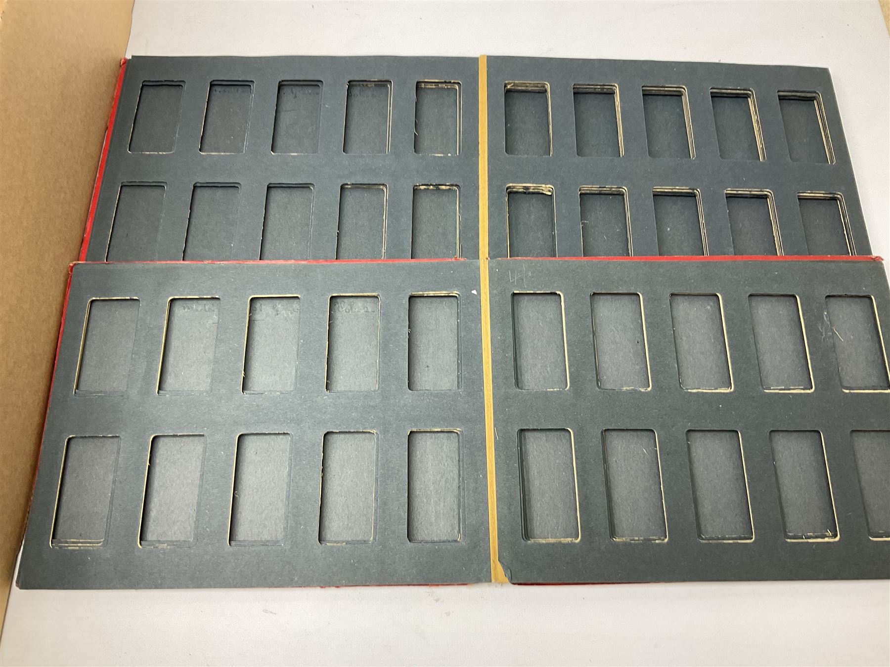 Quantity of cigarette and trade cards, housed in albums and loose, by W.D. & H.O. Wills, John Player & Sons etc, including cycling, garden hints, Britain's railways, dogs etc and various empty vintage cigarette card albums, in two boxes