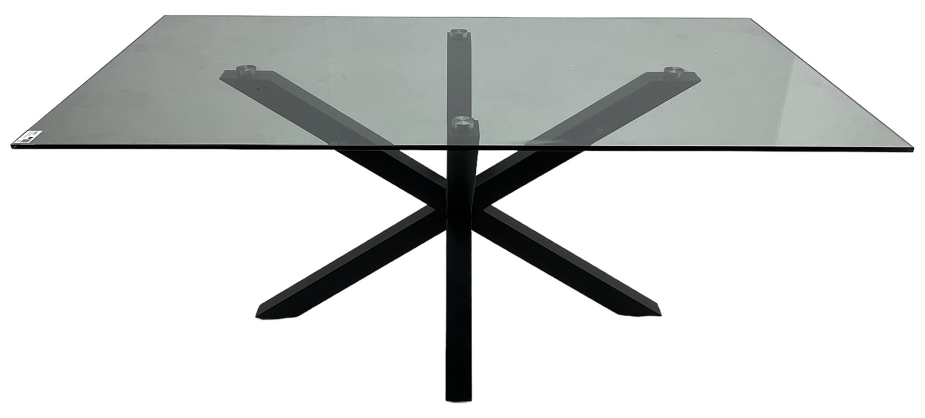 Contemporary glass and metal dining table, rectangular glass top on black finish steel X-framed base