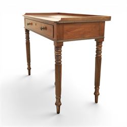 Early 19th century mahogany dressing table, rectangular top with three quarter gallery, frieze drawer with two brass knobs, stamped 'Gillow', raised on turned and reeded supports 