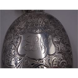Victorian silver hip flask, of oval form, with engraved foliate and scroll decoration, and monogrammed shield shaped cartouche to centre, with plain collar and cap, H11cm, hallmarked Chester 1899, maker's mark worn and indistinct, together with an Edwardian silver glasses case, of oval form, with engraved foliate and scroll decoration, and monogrammed circular shaped cartouche to centre, with opening to top, revealing velvet lined interior, with silver shield clip, H17.5cm hallmarked to case and clip Sanders & Hill,  Birmingham 1908, with a pair of gold plated glasses 
