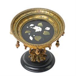 Italian Grand Tour pietra dura and ormolu tazza, the circular black stone top inlaid with a marble floral spray, within a beaded and foliate-cast ormolu rim hung with pendant spheres, on a scroll and acanthus-cast support and turned base, Florence, late 19th century, W15.5cm H12cm