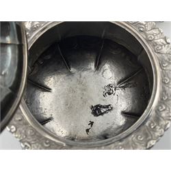 Victorian silver three piece tea service, comprising teapot, twin handled open sucrier, and milk jug, each of bellied form with acanthus capped scroll handles, the sides embossed with alternating scroll edged vacant panels and panels containing a pair of birds, upon four palmette feet, the teapot with ivory insulators to handle, and bird finial to the hinged domed cover, hallmarked William Hunter & Son, London 1861, teapot H19cm, including handles sucrier H13.5cm, including handle milk jug H12cm

This item has been registered for sale under Section 10 of the APHA Ivory Act