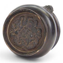 Chinese bronze censer, of circular bellied form with temple lion mask handles, upon a circular foot, with apocryphal six character Xuande mark within a border of two dragons chasing a pearl, H7.5cm D10/5cm
