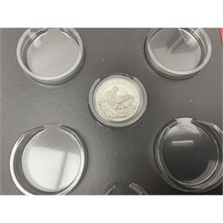 Great British and World coins, including a small number of pre 1920 silver coins, pre-decimal pennies, commemorative crowns, various part filled 'The London Mint Office' commemorative coin folders, Britain's First Decimal Coins sets in blue folders, pre-Euro coinage, United States of America coins etc