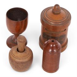 Group of treen, comprising, Mauchline ware coin box, box modelled as pear, egg cup, butter stamp, bell push, sewing implement, weaving tool, and box modelled as book