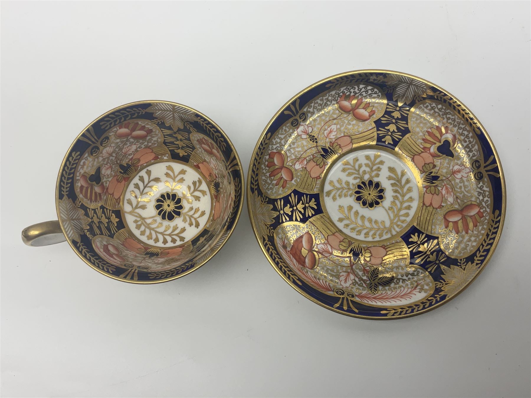 Royal Crown Derby Imari pattern 4971, cup and saucer, circa 1913, together with Royal Crown Derby Imari pattern 1128, trinket dish, circa 1978, both with printed mark beneath 
