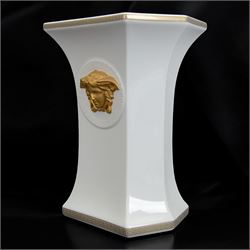 Rosenthal Versace Gorgona vase, of rectagular form with fluted base and rim, decorated in relief with medusa masks and gilt greek key borders upon a white ground, boxed, H23cm