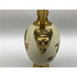 Royal Worcester blush ivory ewer with a satyr mask handle and decorated with floral sprays, raised on a gilt square base, with pattern number 1144 and date code for 1888 beneath, H28cm 