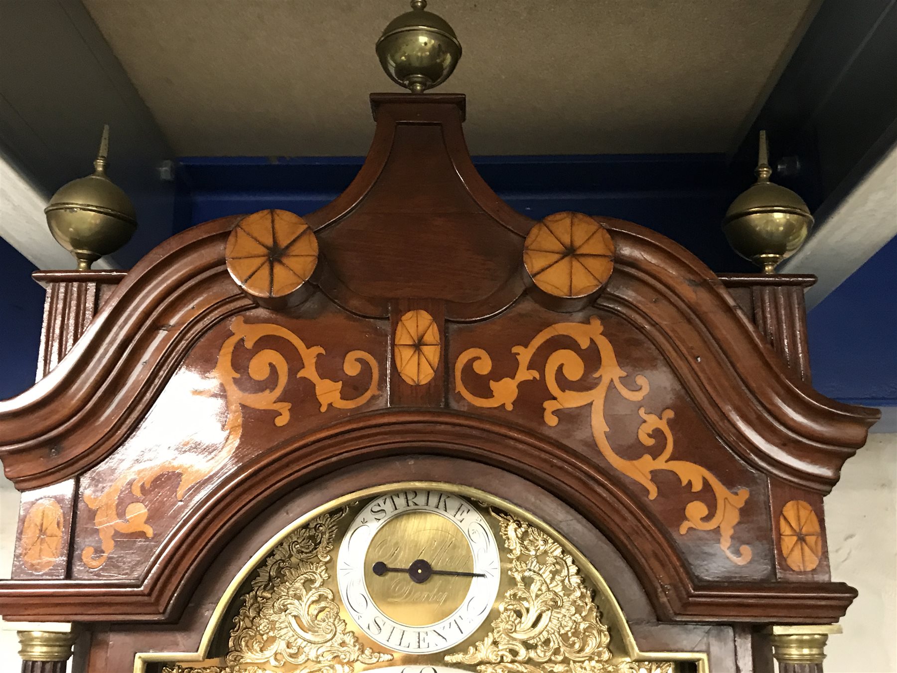 Early 19th century inlaid and cross banded mahogany London style longcase clock, brass arched dial, Roman and Arabic numerals, second and month subsidiary, lattice spandrel, eight day movement, automatic night time silent and strike mode, H242cm (two weights and pendulum)