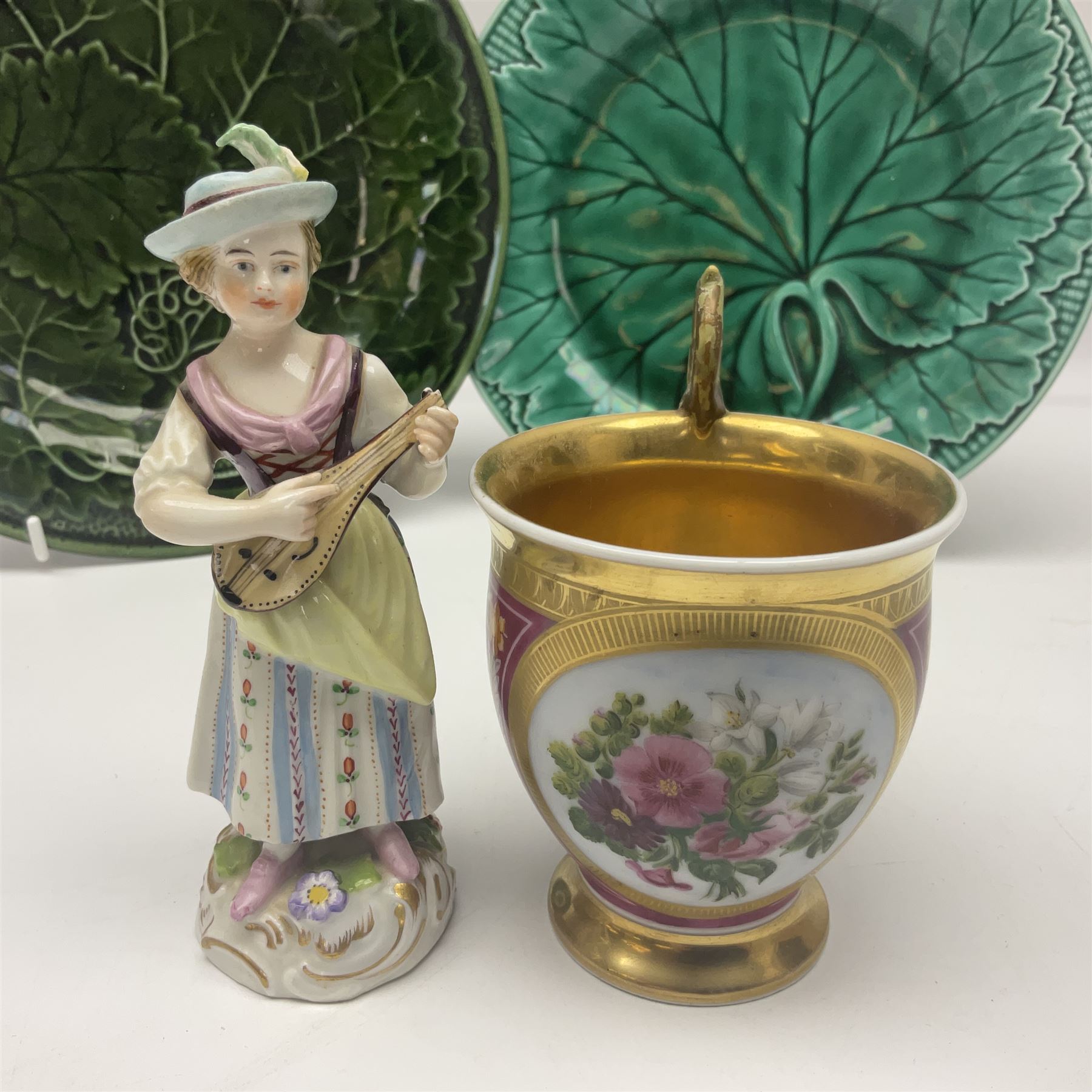 Wedgwood majolica leaf plate, together with another similar and together with a Dresden figure, etc 