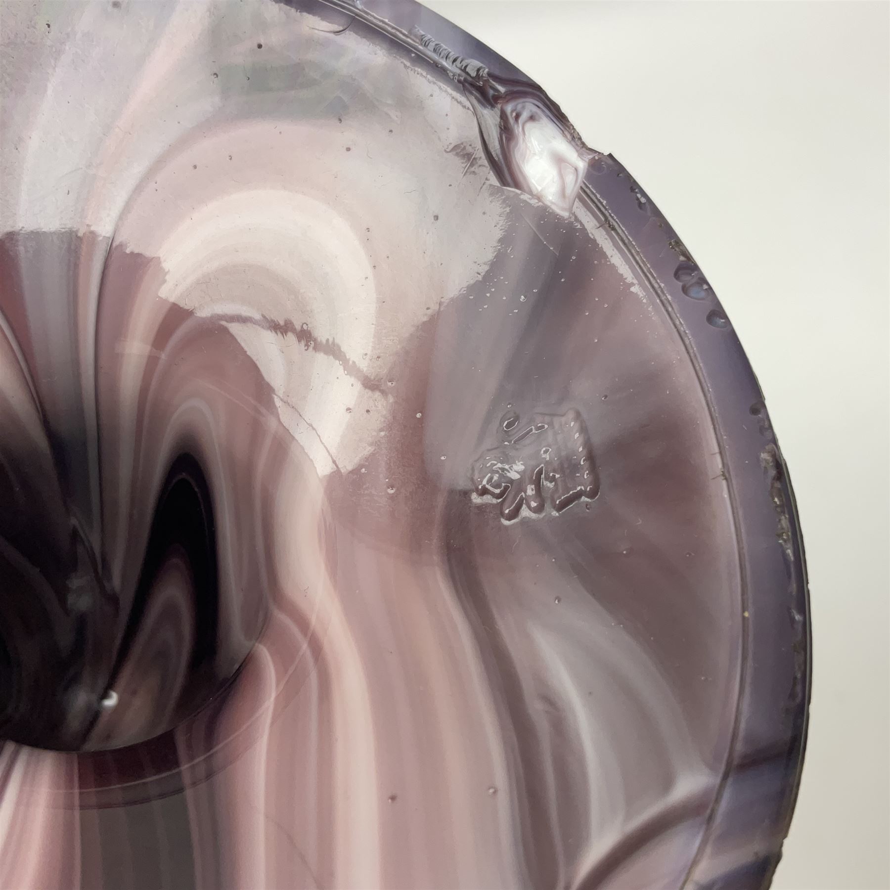 Daum glass two stemmed candle stick signed to verso, together with a pair of slag glass purple candle sticks, Daum H21cm