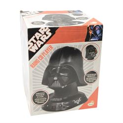 Star Wars Darth Vader Radio CD Player, boxed, together with ceramic Darth Vader money box, Princess Leia Bobblehead, three Scholastic Star Wars Episode I books, limited edition Star Wars Episode I The Phantom Menace Art Book, The Star Wars Vault book by Stephen Sansweet and a collection of Star Wars calendars