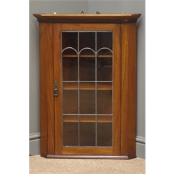  Edwardian mahogany hanging corner cabinet, projecting cornice, hinged lead glazed door with lock, W58cm, H79cm, D34cm  