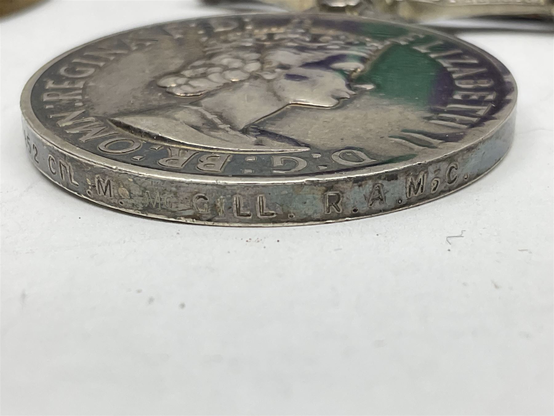 Korean War group of three medals comprising ERII Korea Medal awarded to 22307852 Pte. M. McGill R.A.M.C., UN Korea Medal and ERII General Service Medal with Malaya clasp to 22307852 Cpl. M. McGill R.A.M.C.